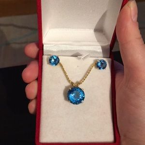 Blue topaz and gold necklace and stud set
